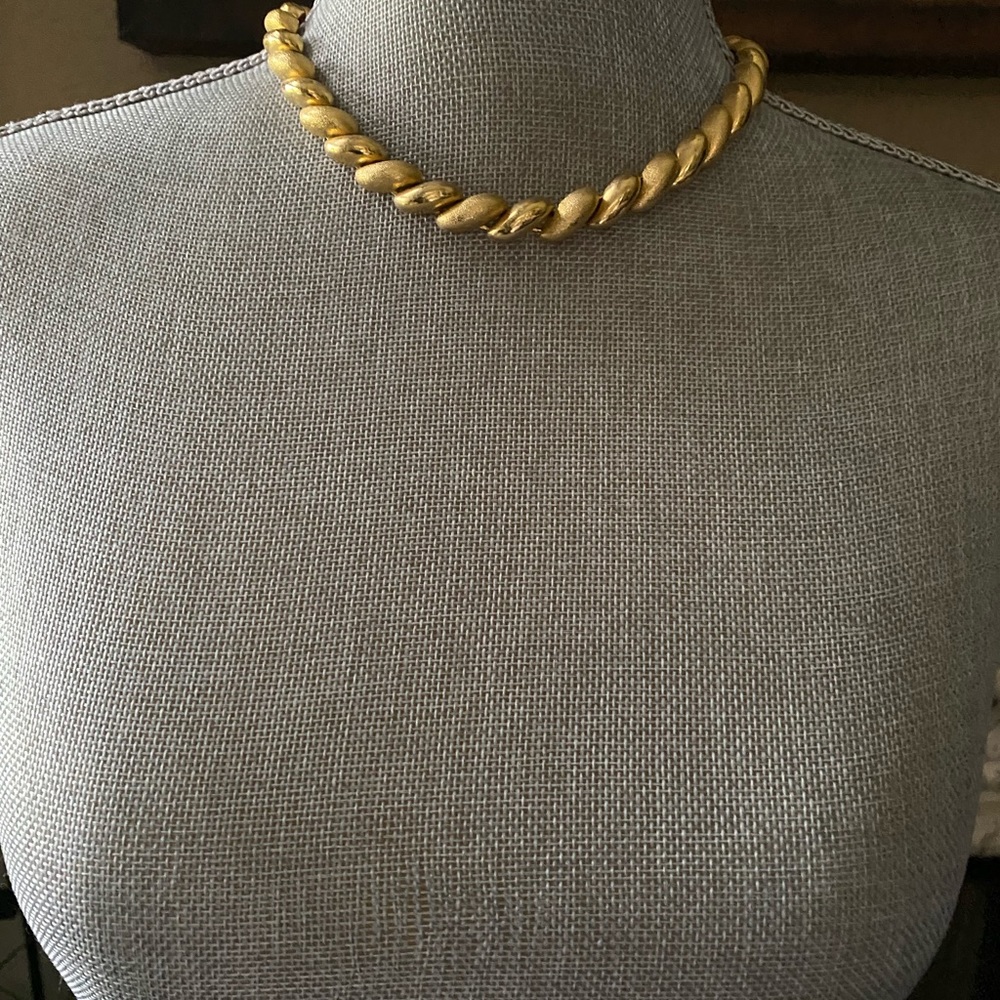 Gold colored necklace